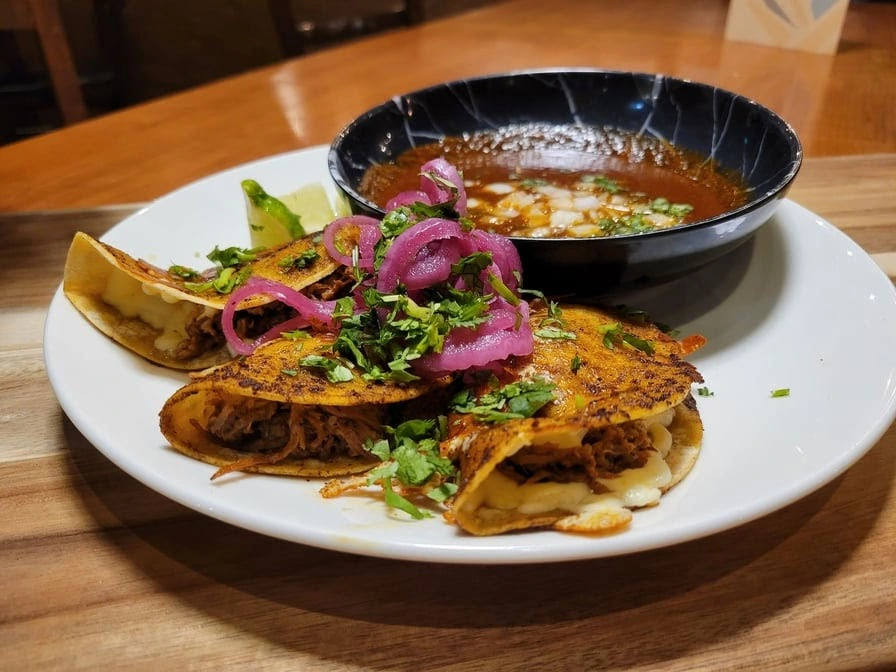 Pizza Fiamma serving McPhillips Winnipeg with Indian fusion pizza delivery